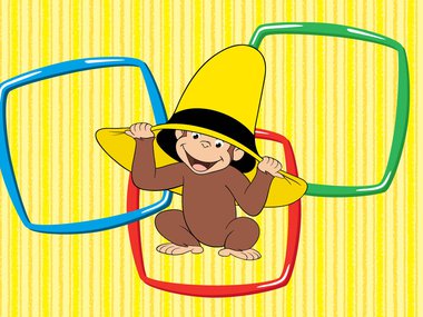 Curious George™ wearing a yellow hat for the Curious Georige: Let's Get Curious touring exhibition.jpg