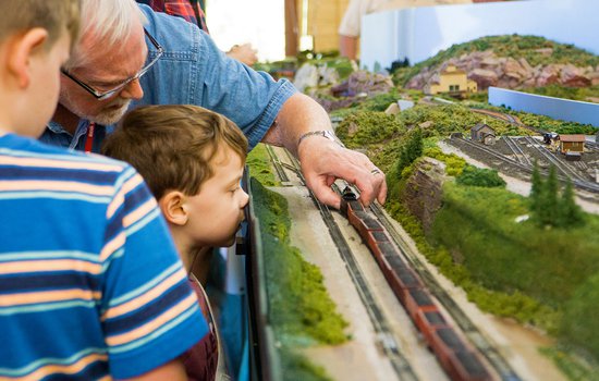 Child enjoys model trains at Rail Days event at the Danville Science Center