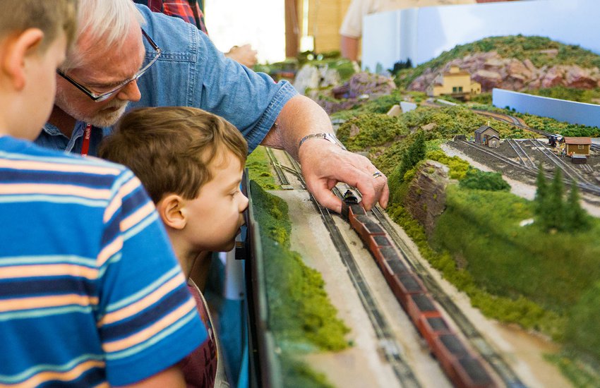 Child enjoys model trains at Rail Days event at the Danville Science Center